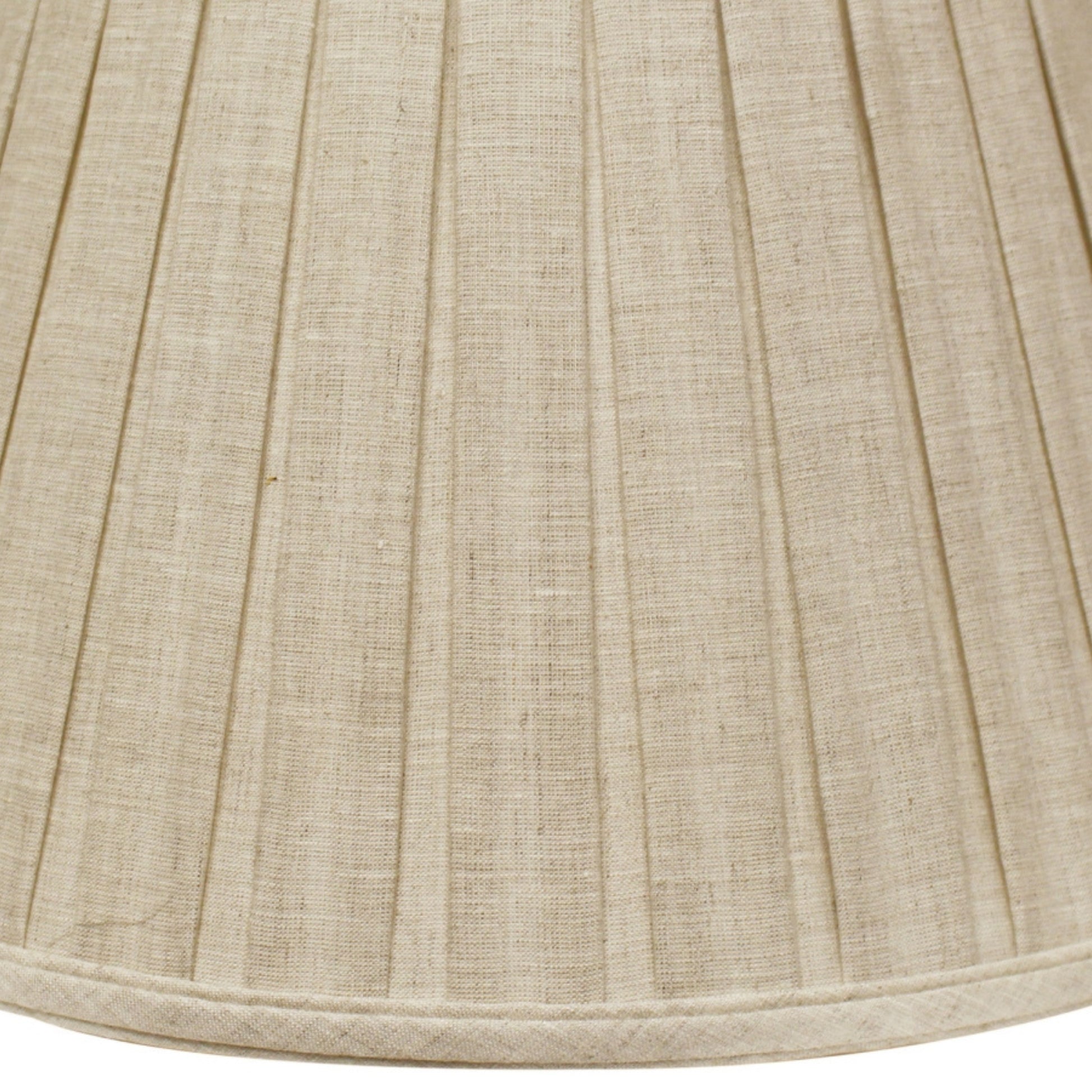Textured natural linen lampshade with delicate pleats providing warm diffused light