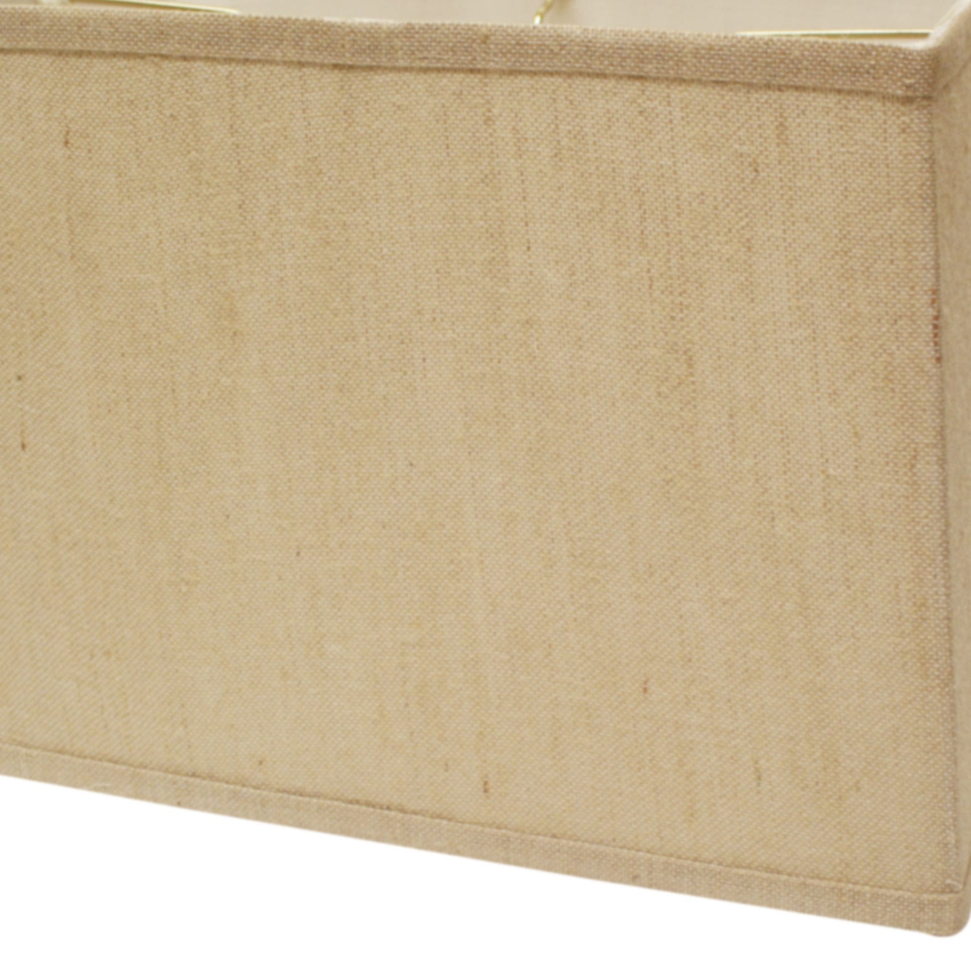 Textured beige linen drum lampshade with a gold frame trim for a warm glow