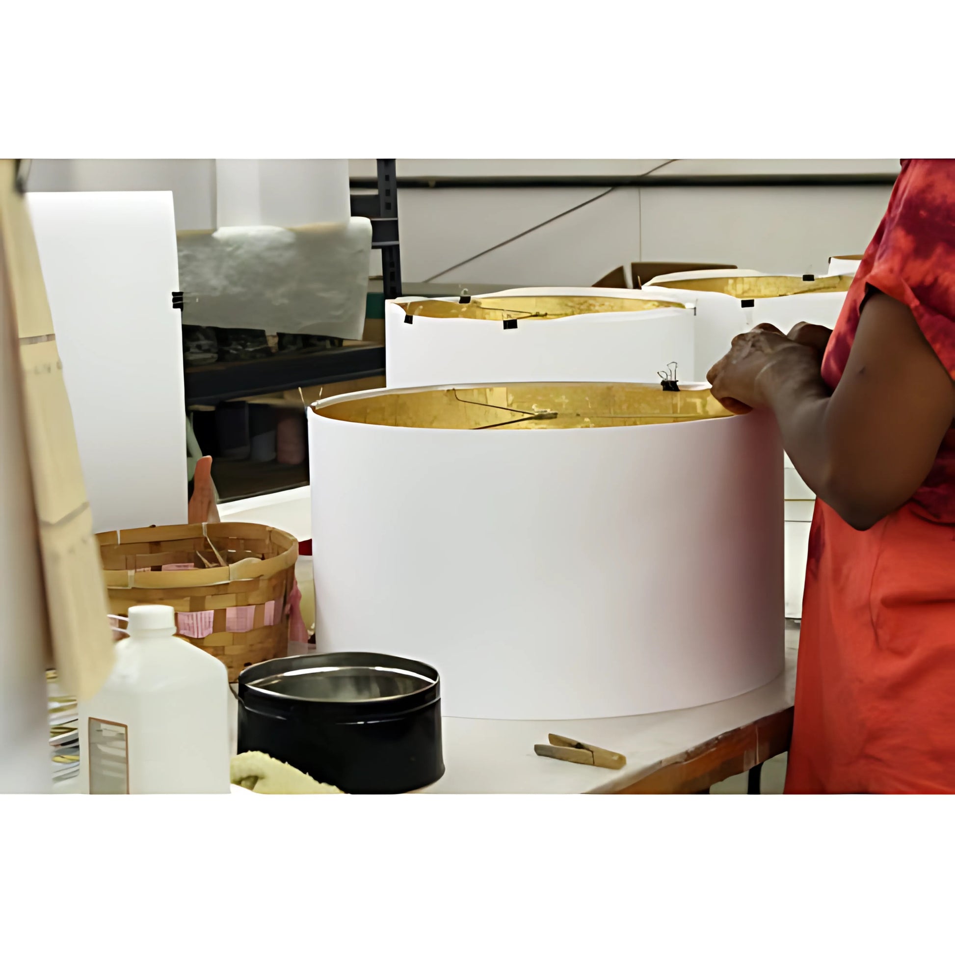 White drum lampshade with gold lining in production