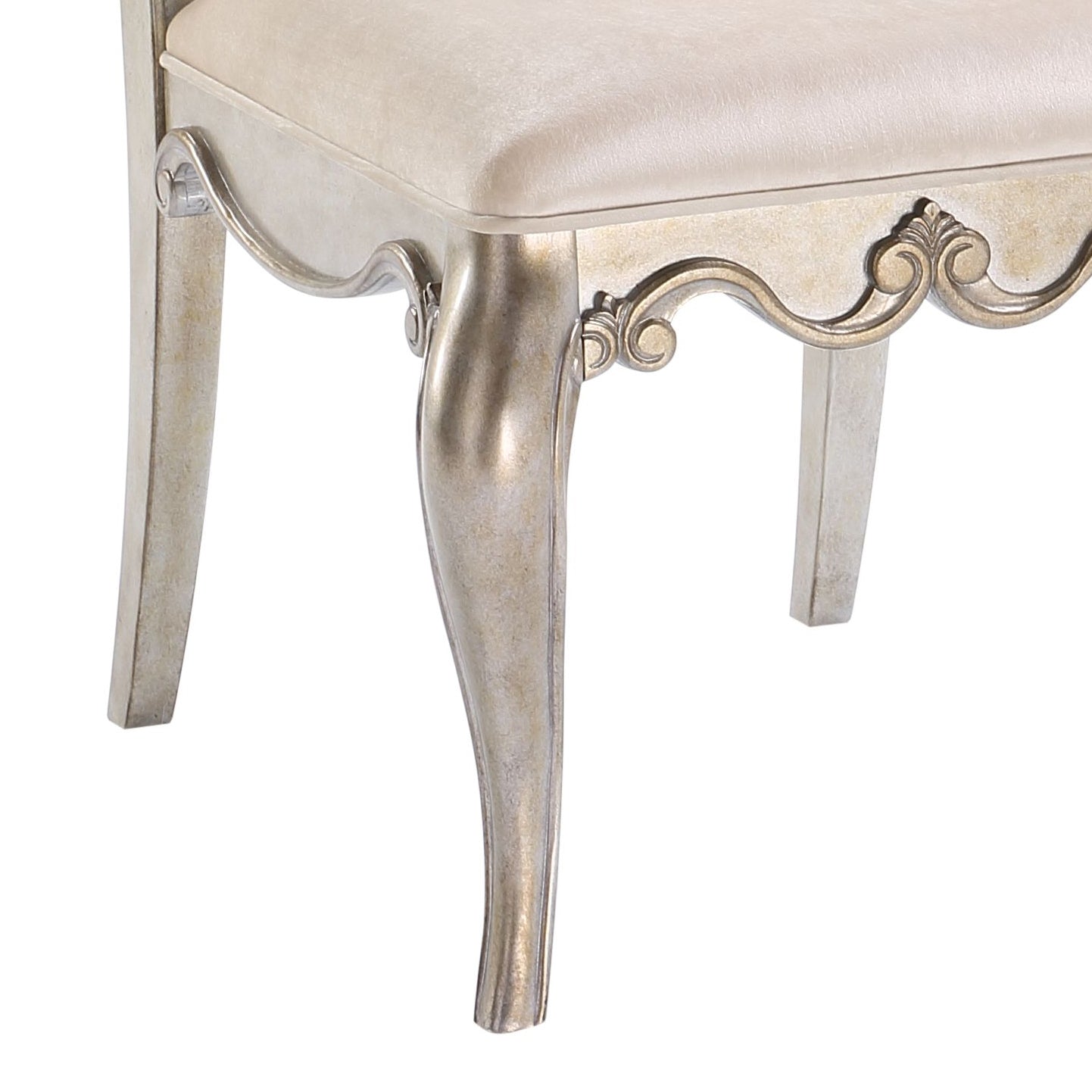 Antique gold baroque accent chair leg with ornate scrollwork carving