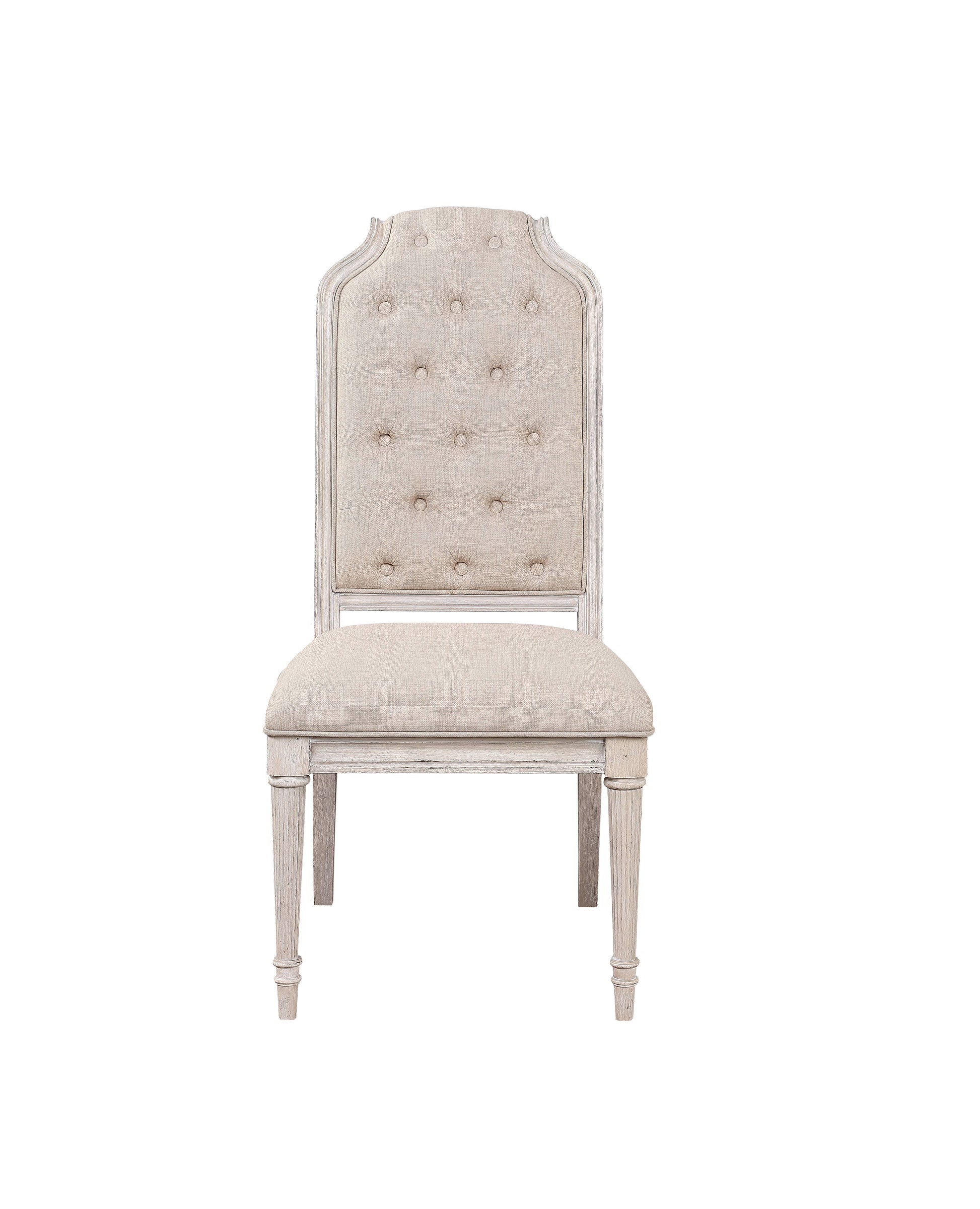 Tufted beige upholstered dining chair with distressed wood frame