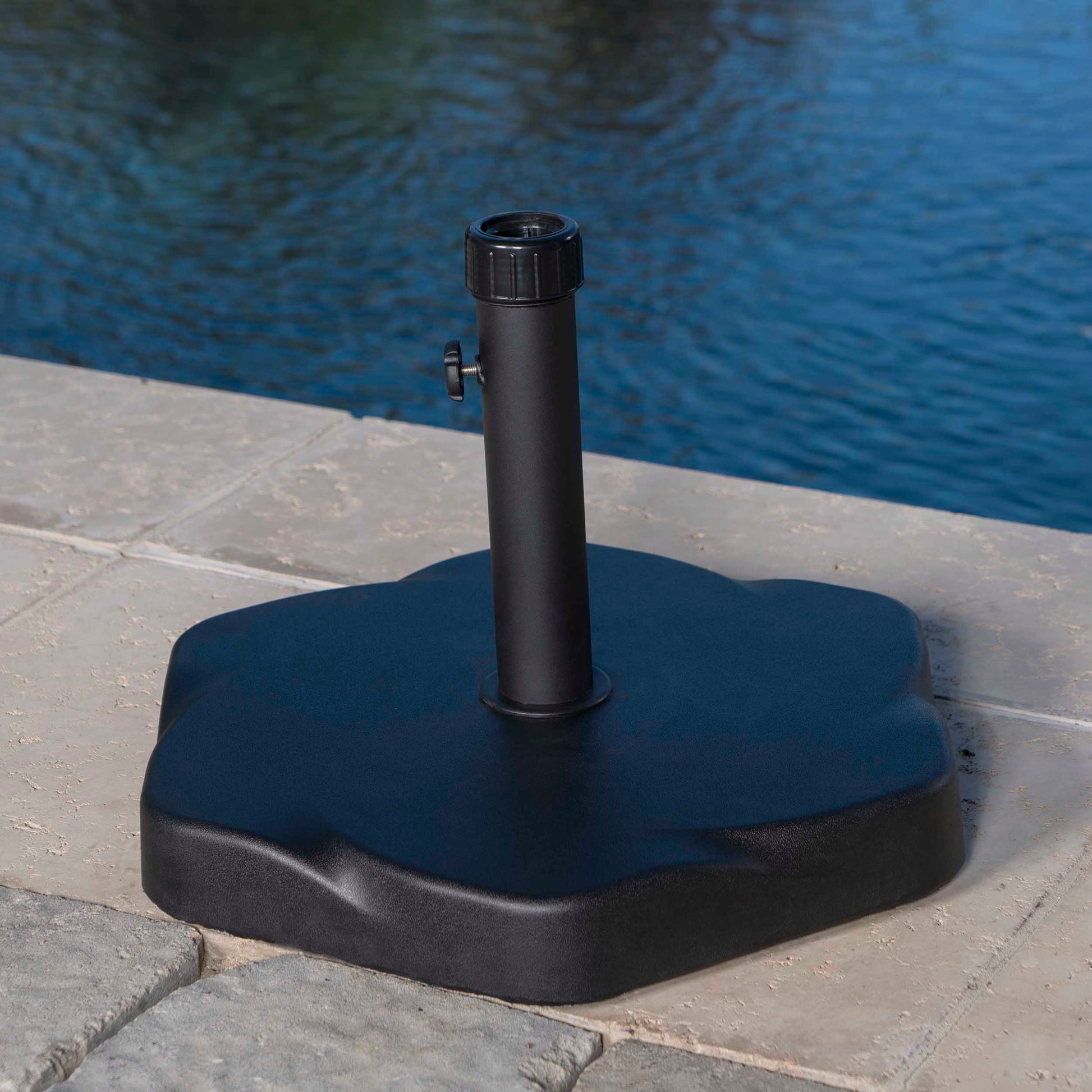 Black resin patio umbrella base with adjustable height pole support