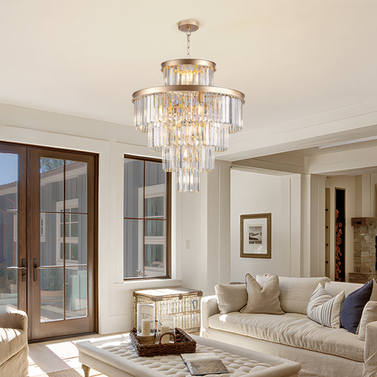 Glamorous crystal tiered chandelier with brushed gold finish ideal for dining rooms