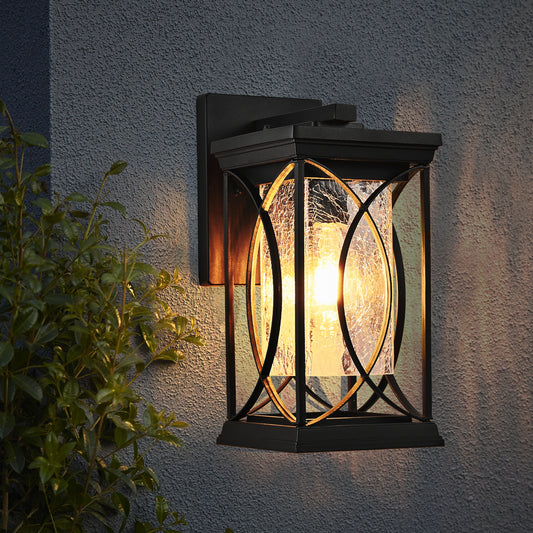 Black outdoor lantern with textured glass and decorative metalwork perfect for entryway lighting