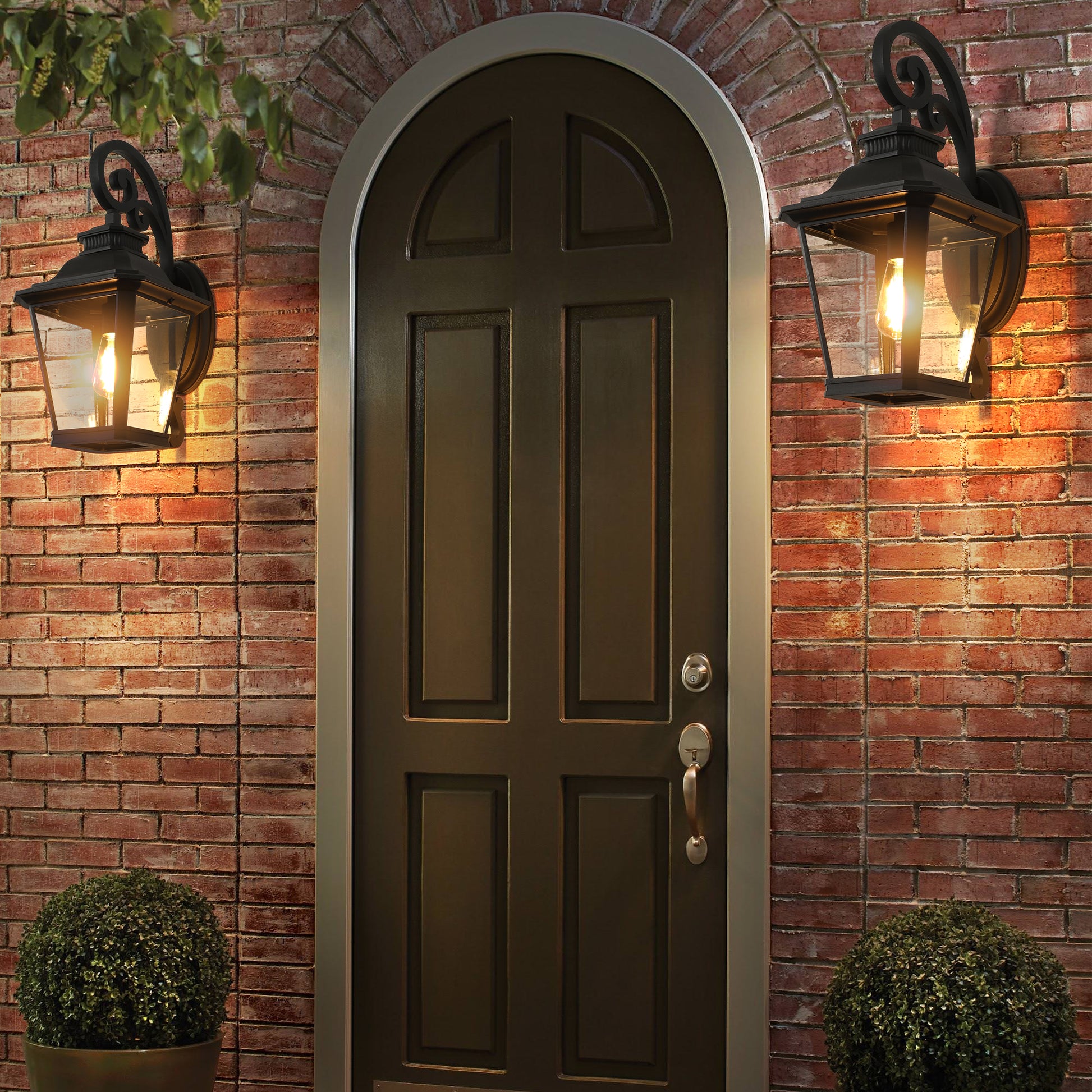 Classic black outdoor wall lantern with clear glass panes ideal for entryway lighting