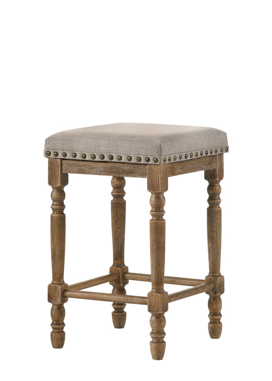 Rustic counter stool with a neutral fabric seat and nailhead trim