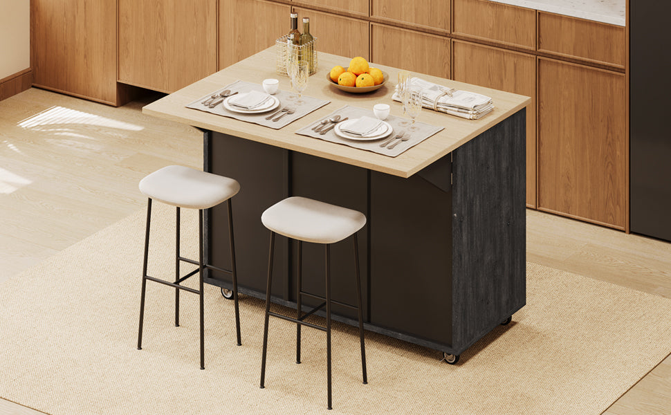 Modern kitchen island with light wood countertop and dark distressed base featuring two breakfast bar stools