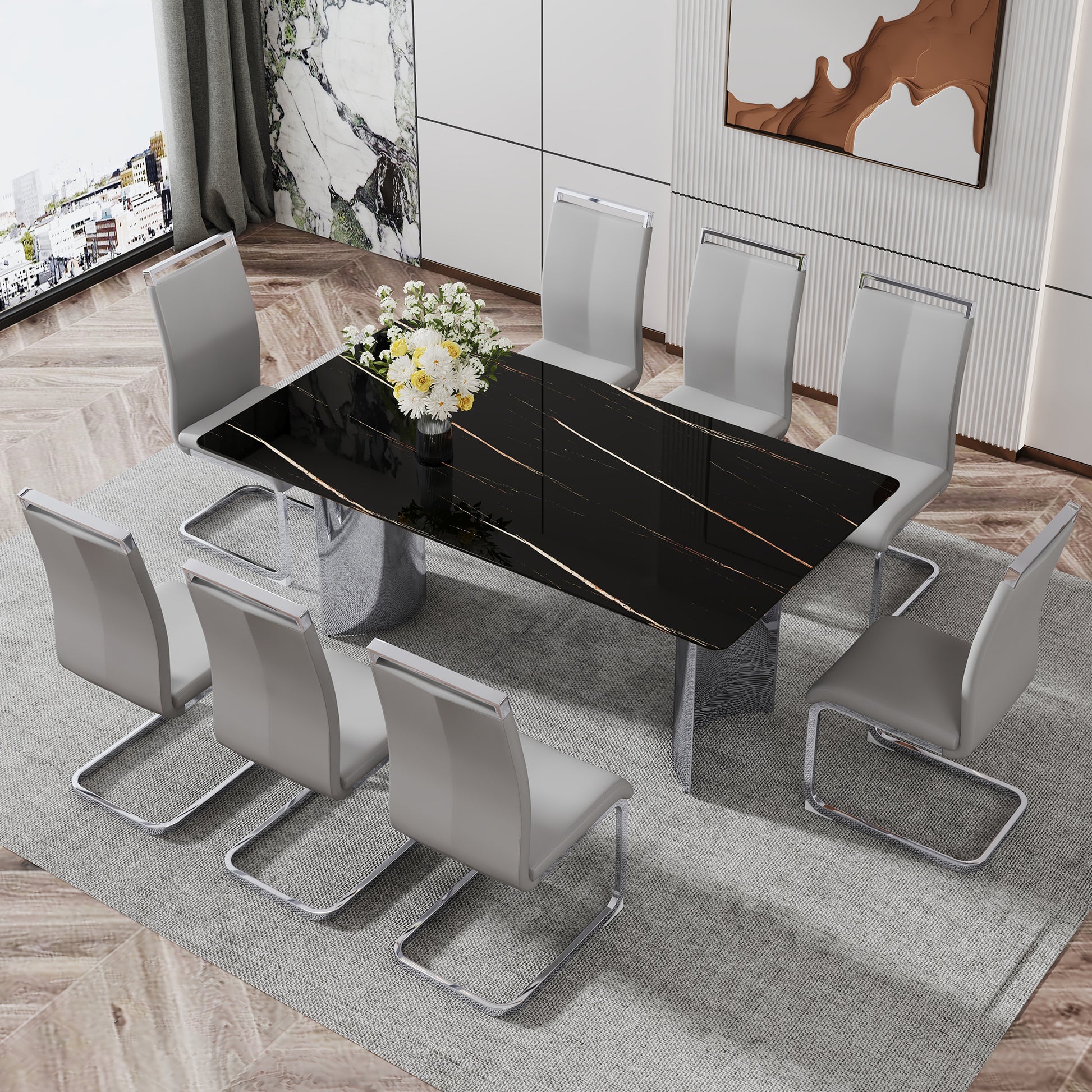 Modern dining set with glossy black marble table and eight grey leather chairs