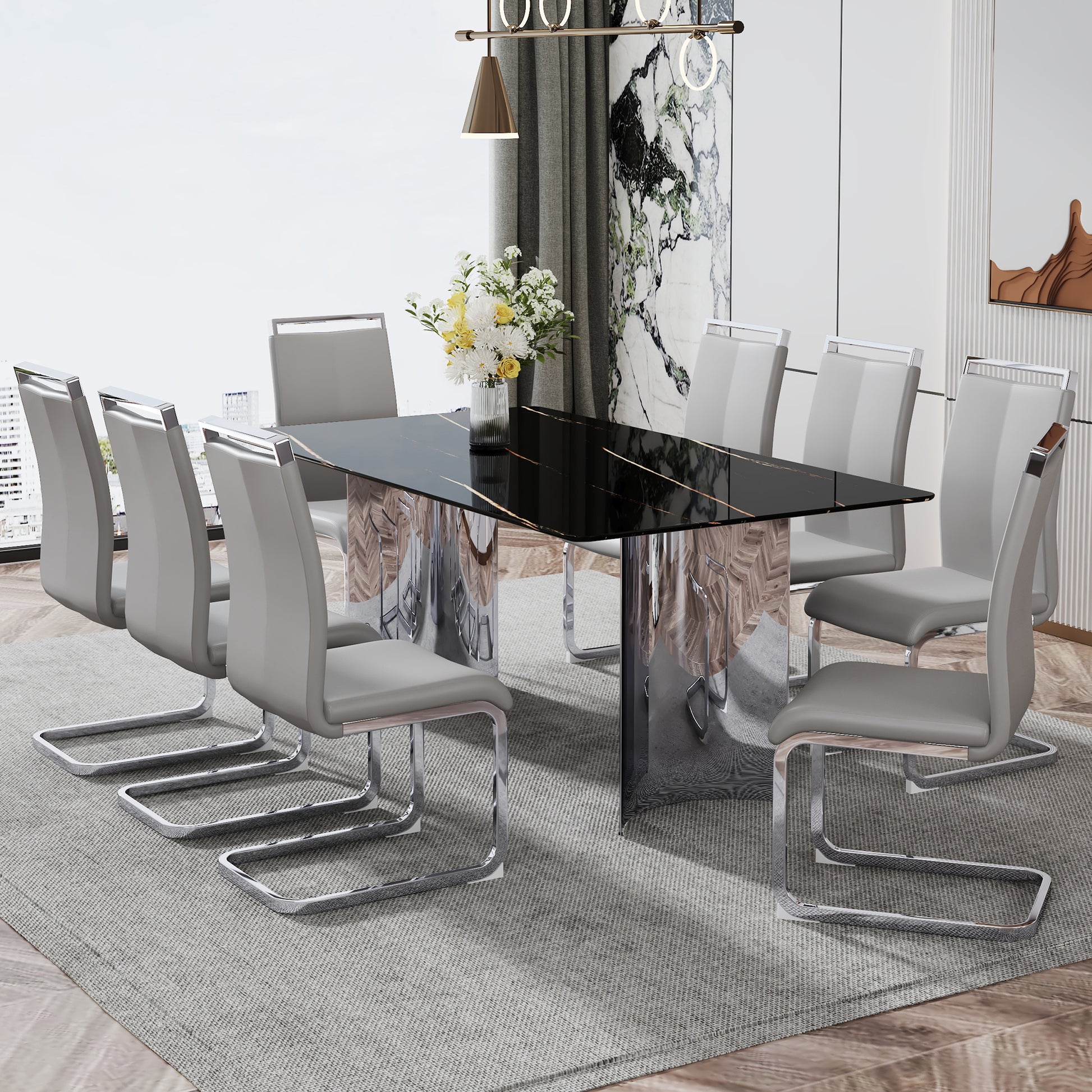 Modern black marble dining table with gold veining and chrome base seats eight