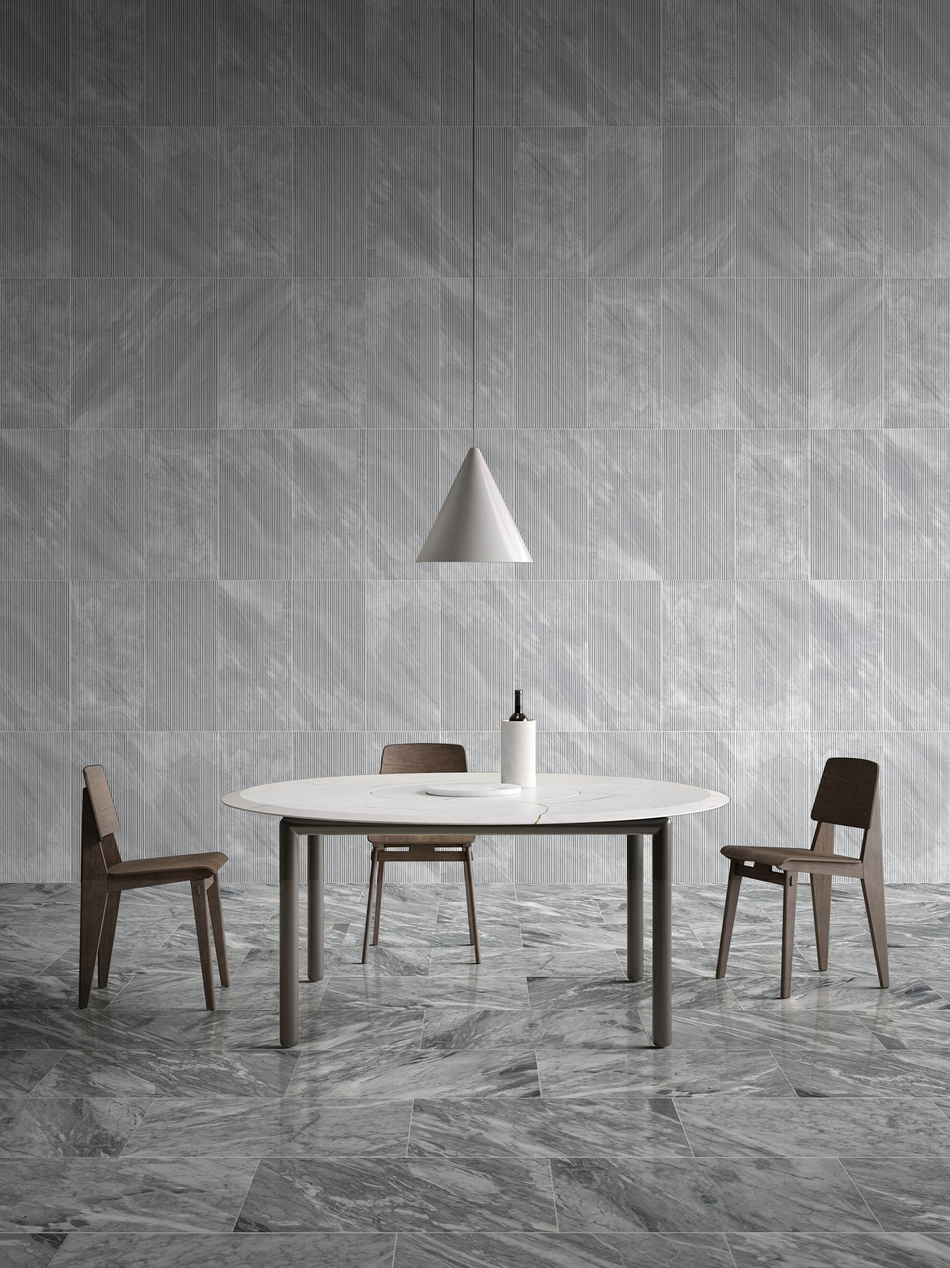 Modern round dining table with white marble top and dark metal legs