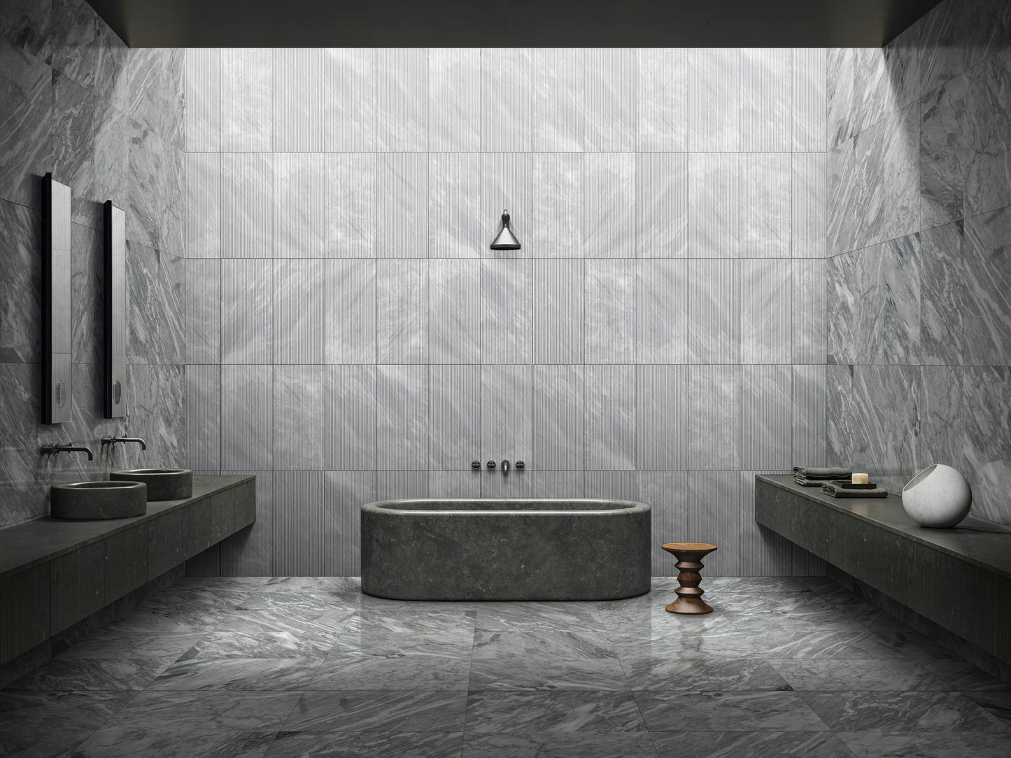 Luxurious dark grey marble bathtub with sleek modern faucet ideal for a spalike bathroom