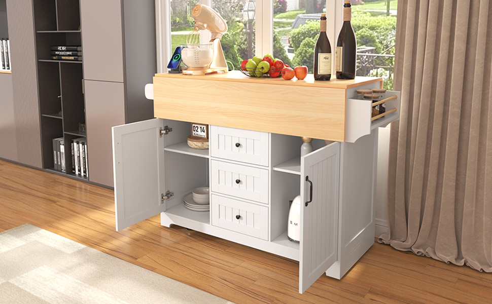 White kitchen island with wood butcher block countertop drawers and cabinet storage for kitchenware