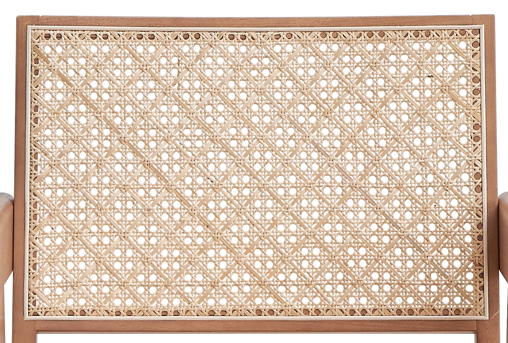Closeup of natural rattan woven pattern on a wooden chair back