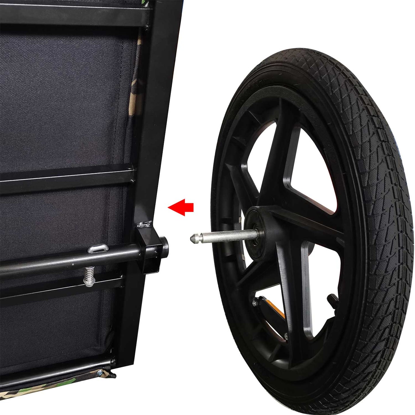 Black utility trailer wheel with knobby tire ready to attach to cargo frame