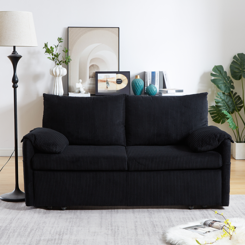 Black corduroy sofa with plush cushions perfect for a modern living room