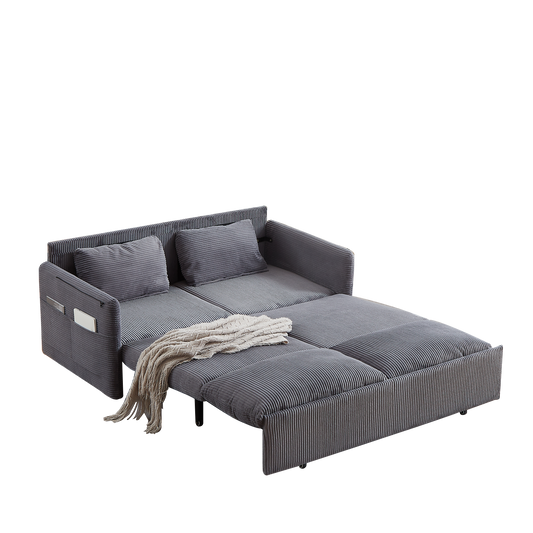 Gray corduroy sofa bed with side storage pockets and throw blanket