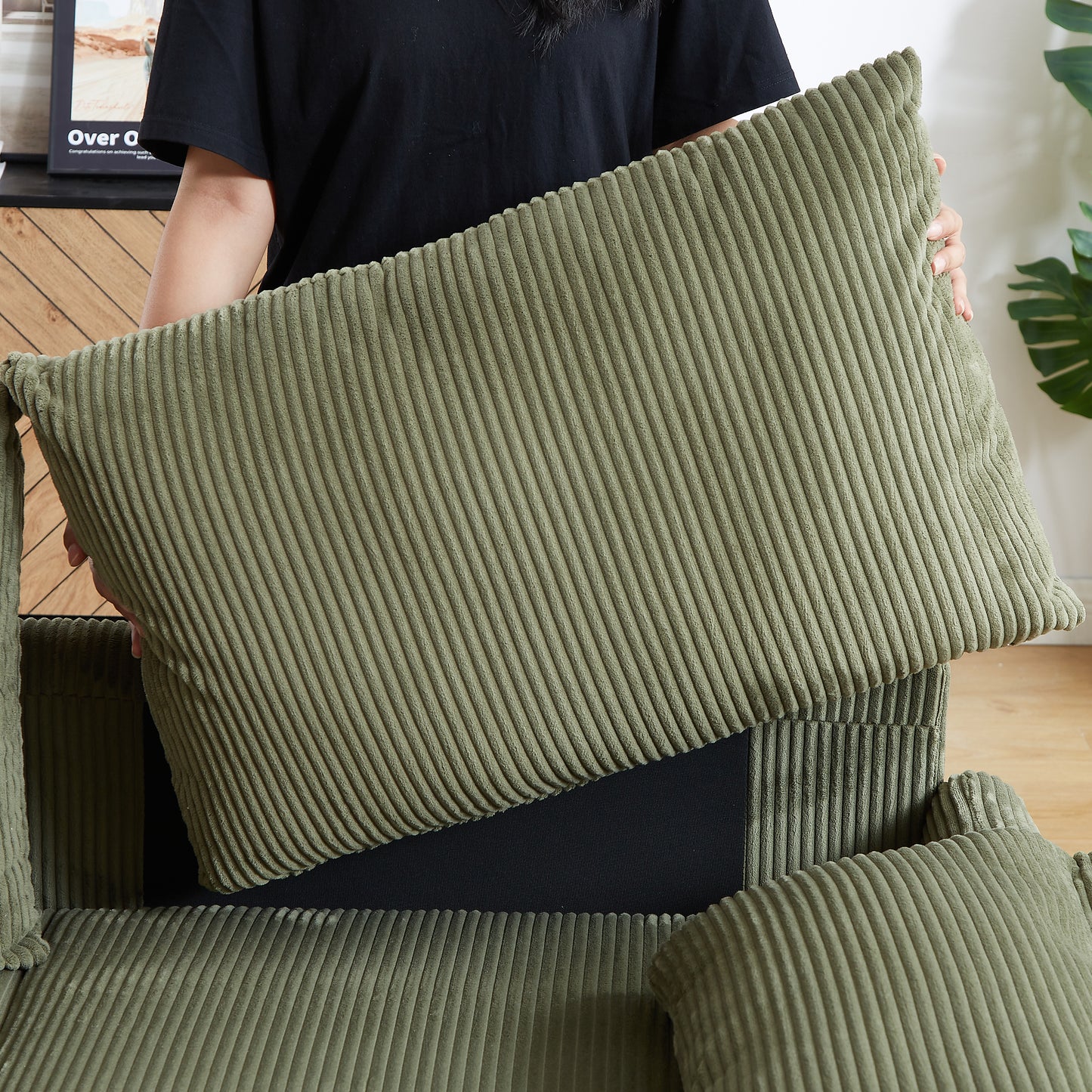 Sage green corduroy throw pillow with vertical ribbed texture