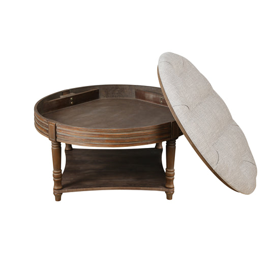 Dark wood round coffee table with open storage shelf and tufted linen lid