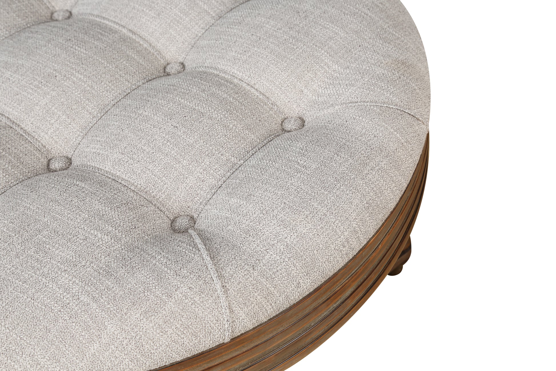 Tufted grey fabric ottoman with carved wooden base