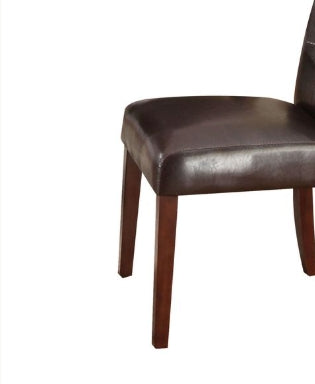 Brown leather dining chair with dark wood legs