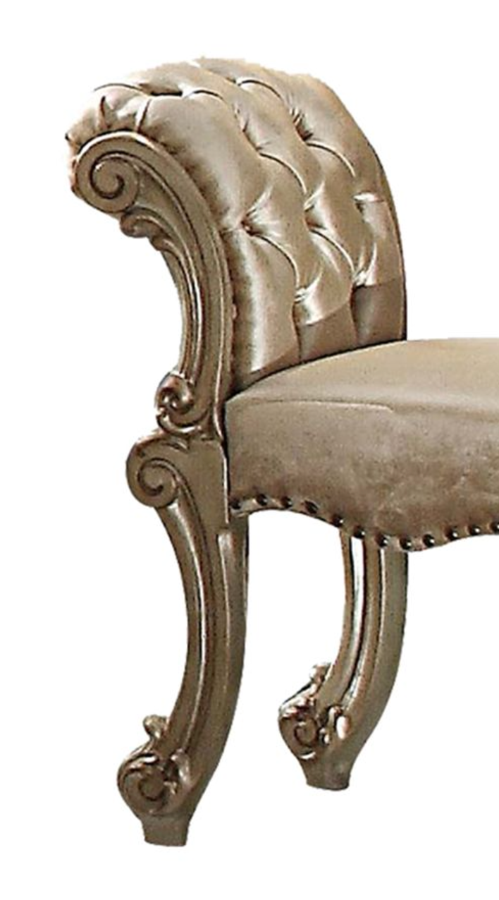 Tufted champagne velvet bench with ornate carved legs