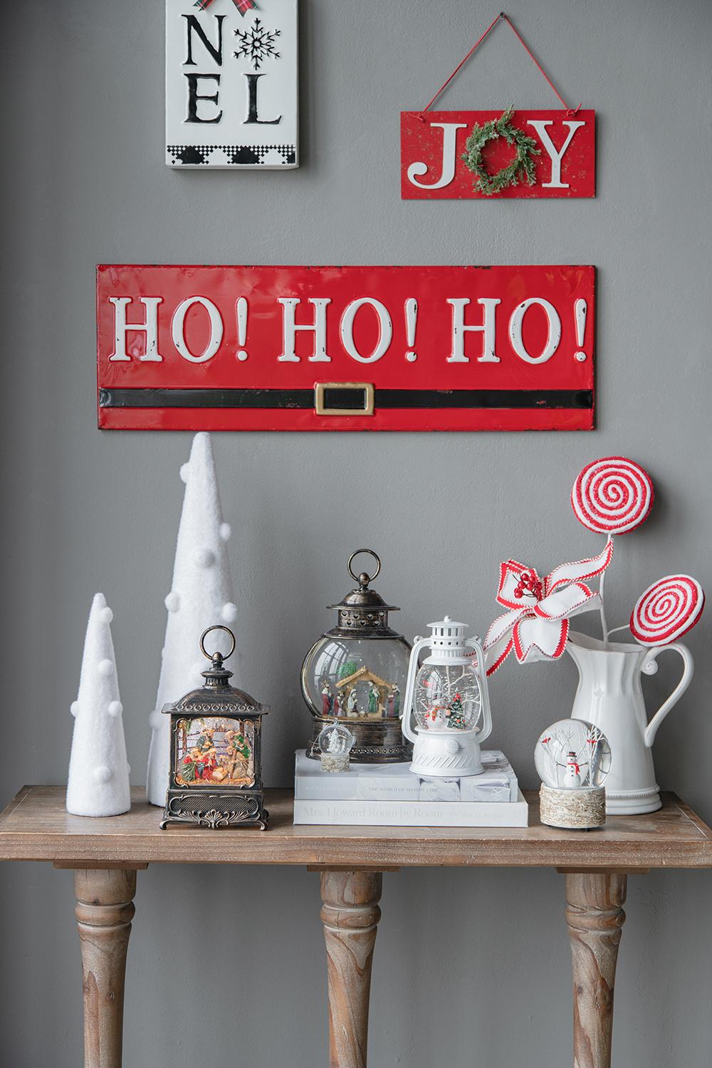 Vintagestyle metal HO HO HO sign with belt buckle detail for festive decor