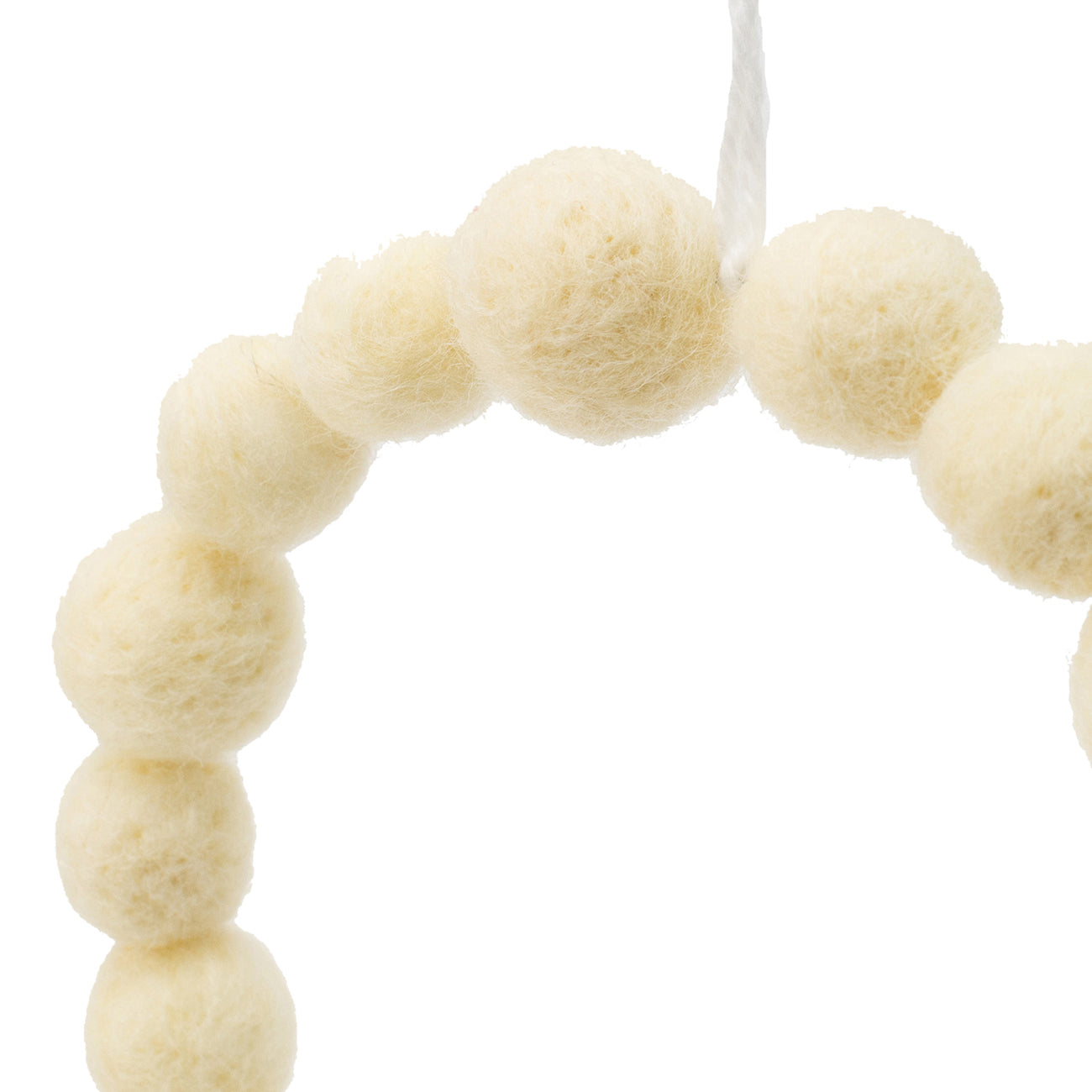 Cream felt ball garland with white string ideal for nursery decor