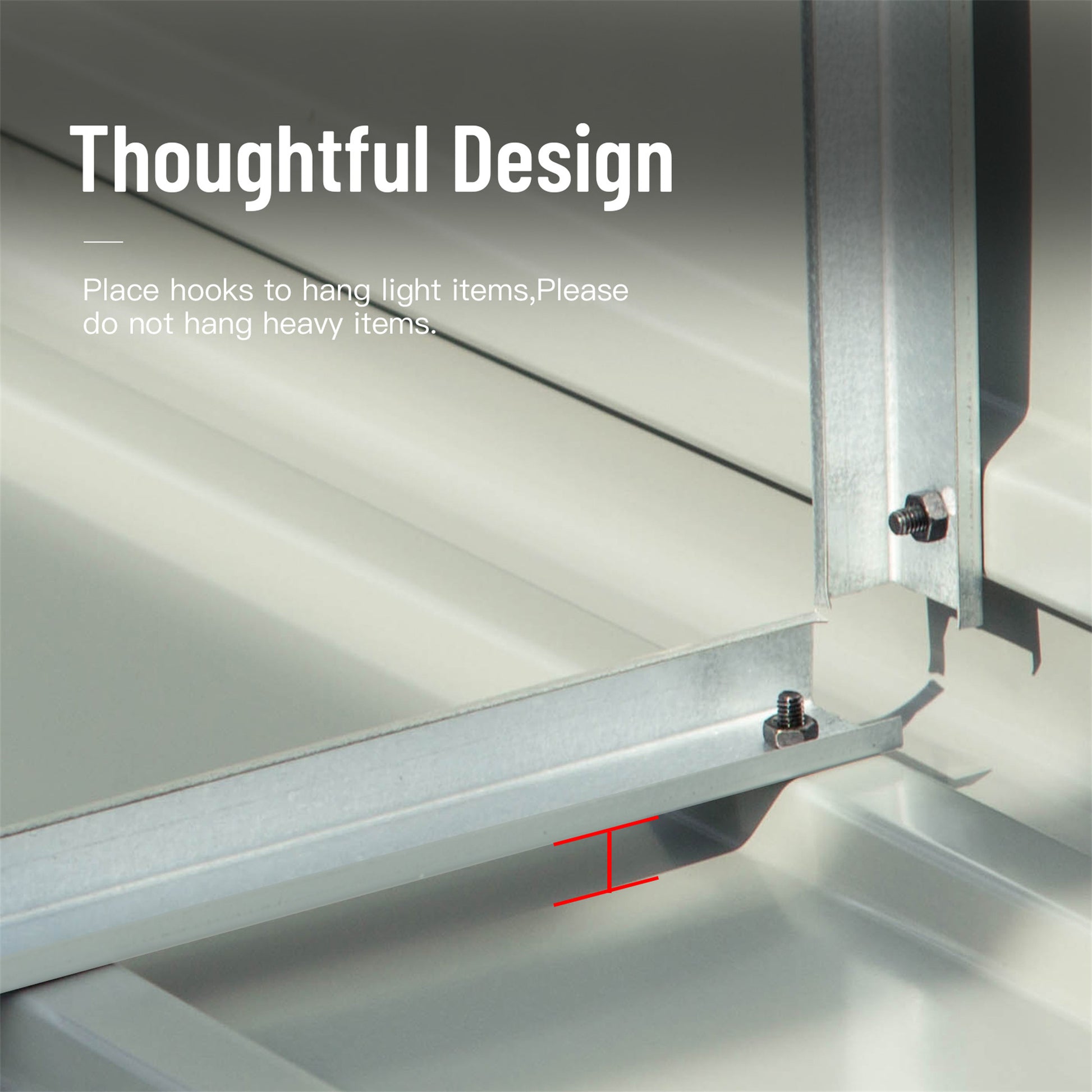 Closeup of galvanized steel shed frame showing construction detail and a bolt for assembly