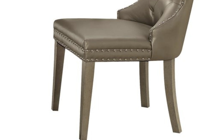 Taupe upholstered accent chair with silver nailhead trim and tufted back