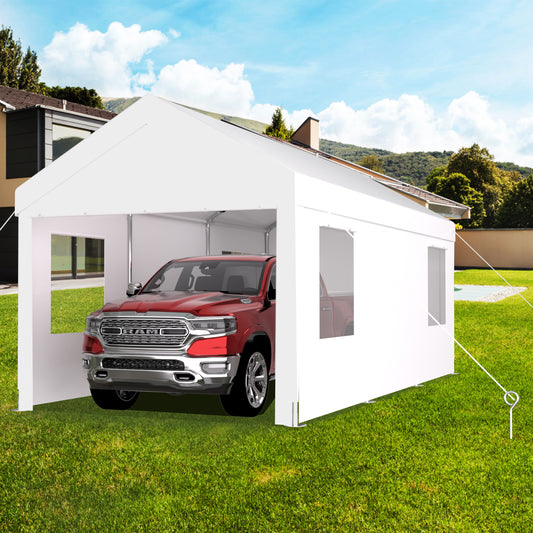 White carport tent protects a red Ram  pickup truck on a green lawn