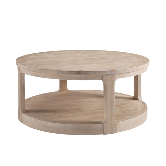 Round weathered oak coffee table with two tiers and carved top detail