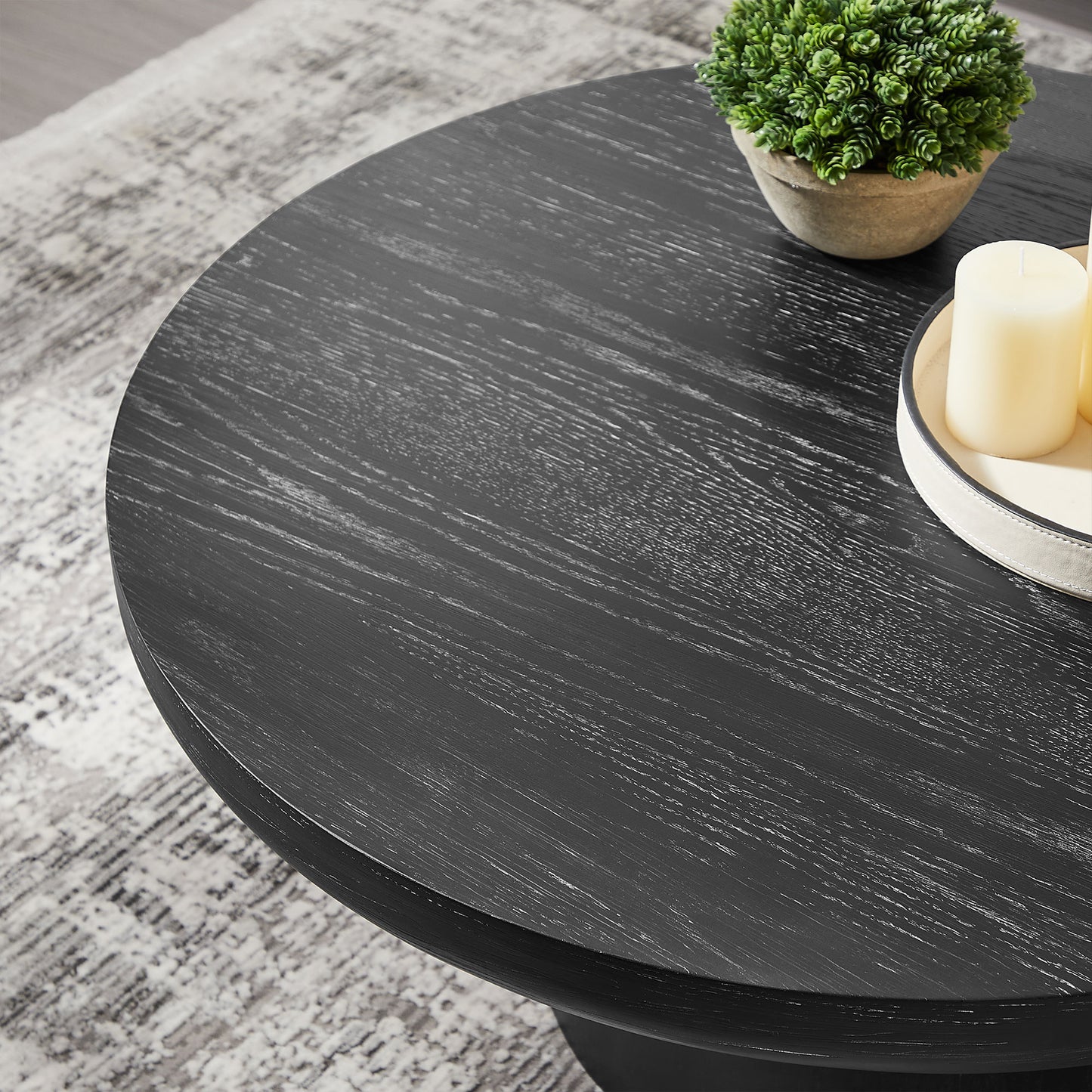 Round black wood coffee table with distressed finish perfect for living room