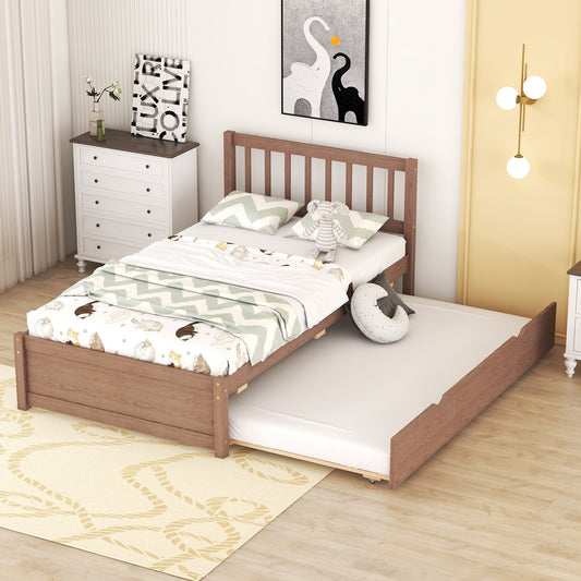 Wooden twin bed frame with trundle featuring a slatted headboard and whimsical catthemed bedding