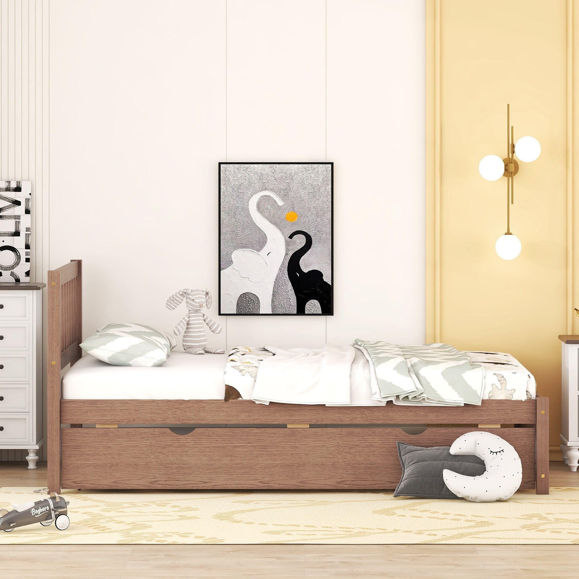 Dark wood twin daybed with trundle and white bedding