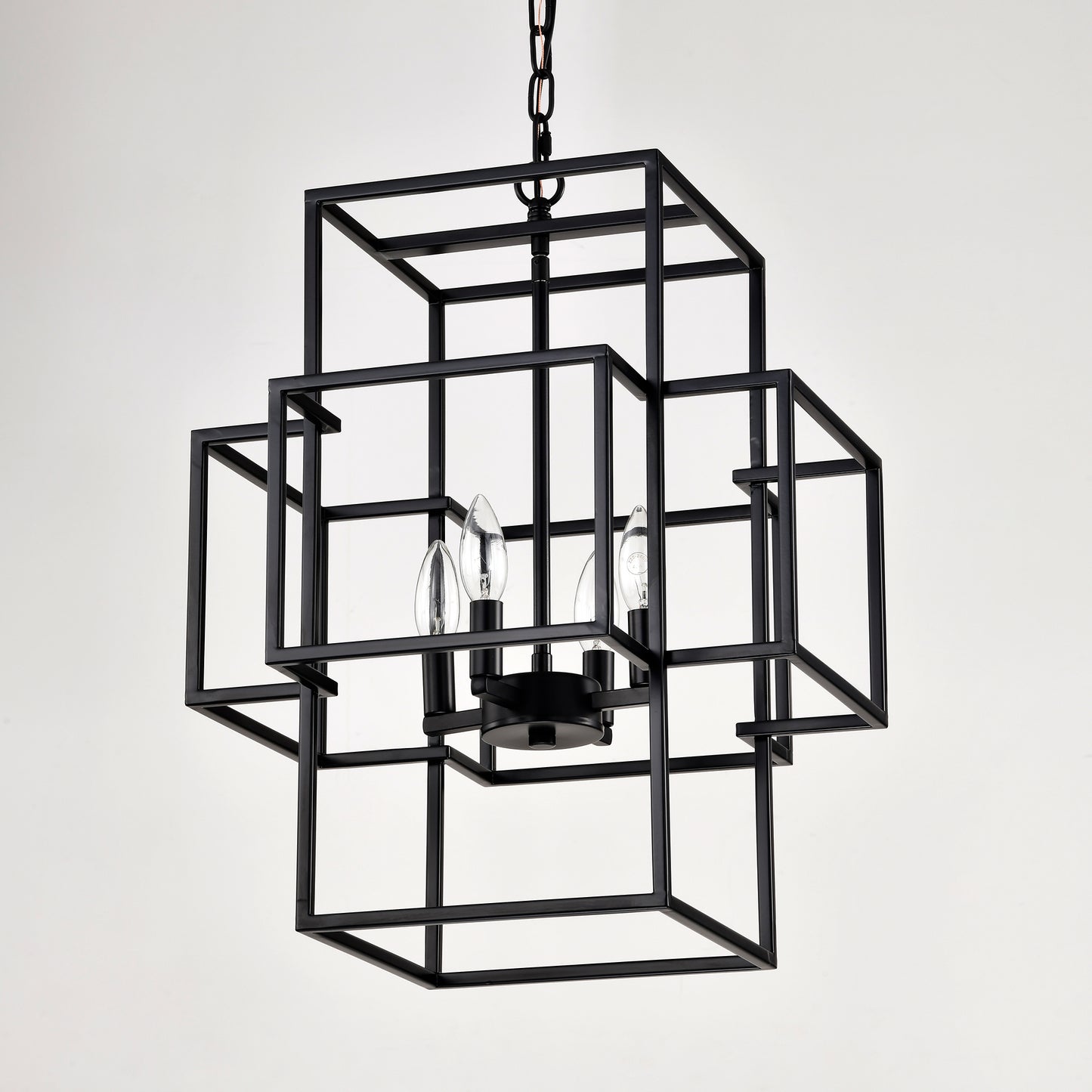Modern black metal geometric cage chandelier with four candelabra bulbs