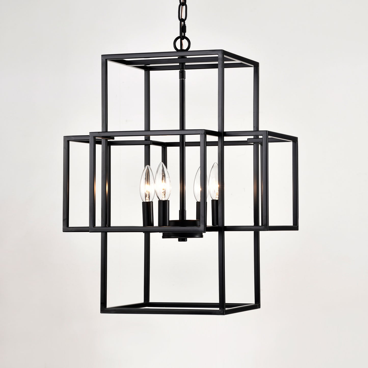 Modern black geometric chandelier with four candelabra bulbs and metal frame