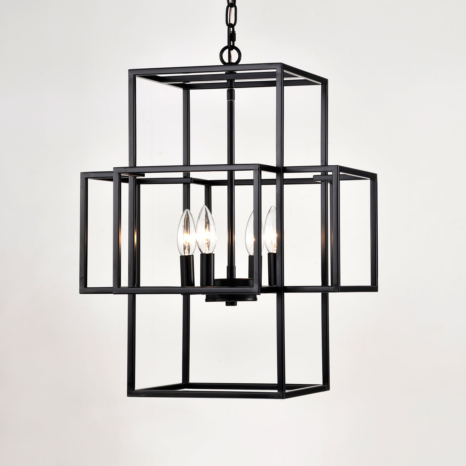 Modern black geometric chandelier with four candelabra bulbs and metal frame