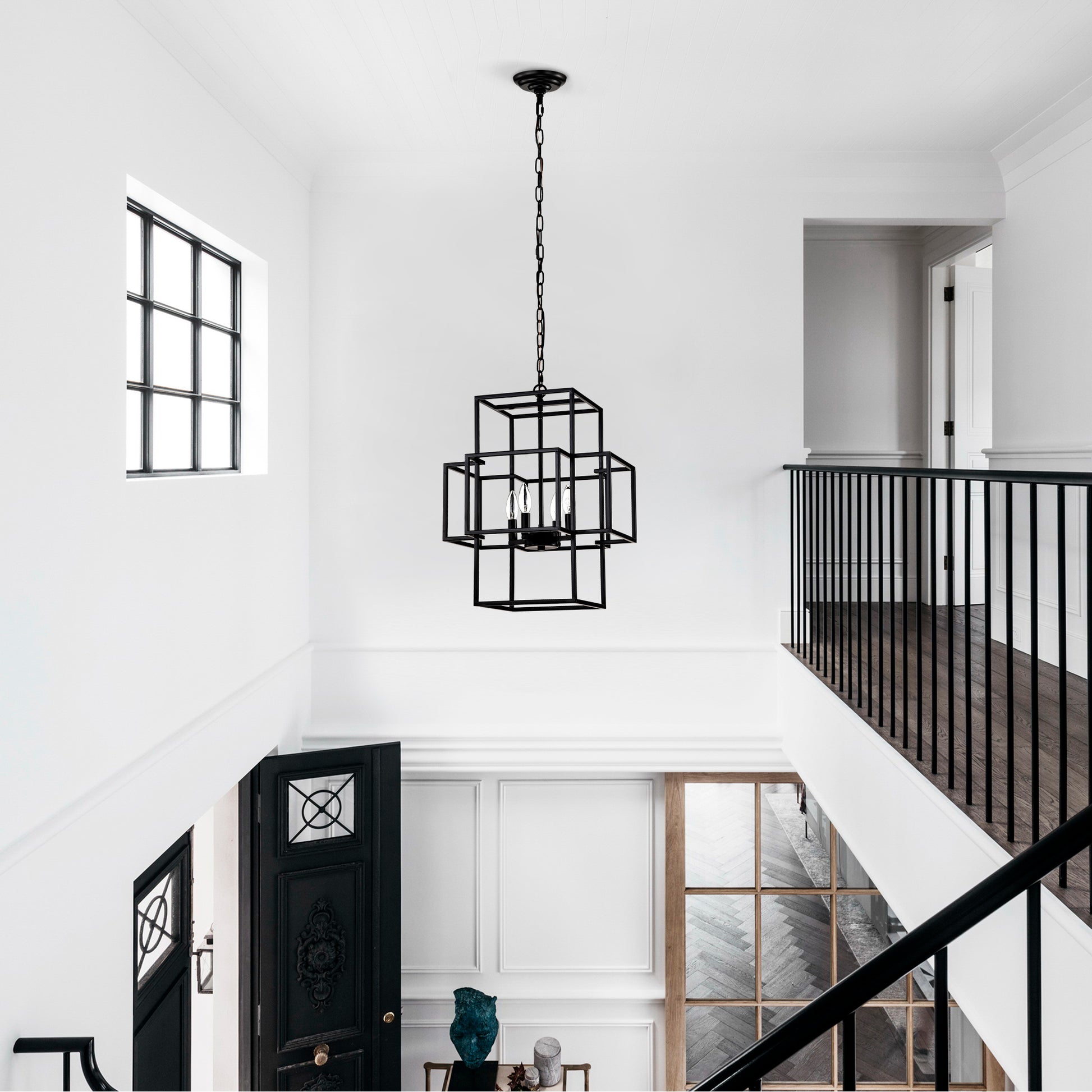 Modern geometric black chandelier with three exposed bulbs a statement piece for entryway lighting