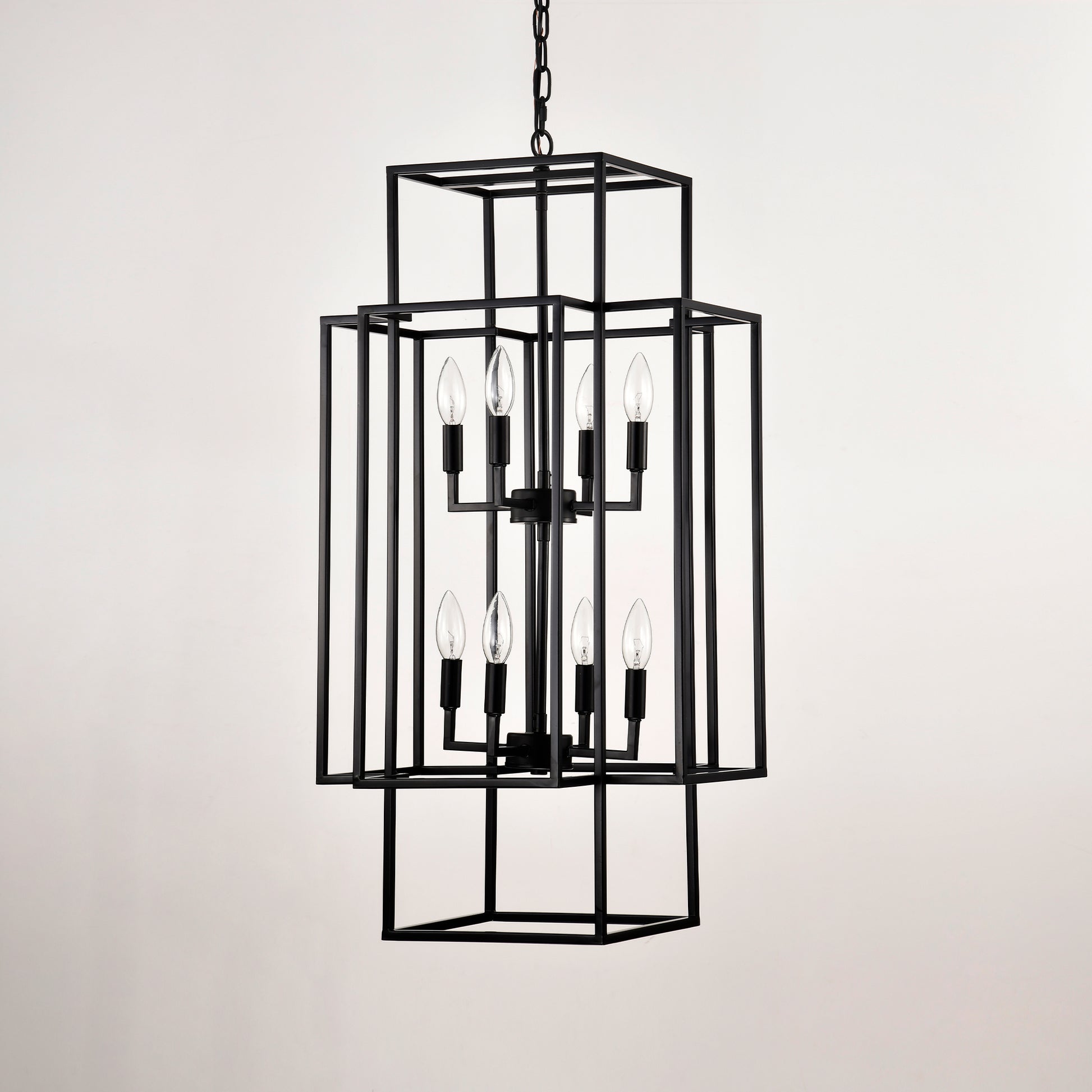 Black metal geometric tiered chandelier with eight exposed bulbs