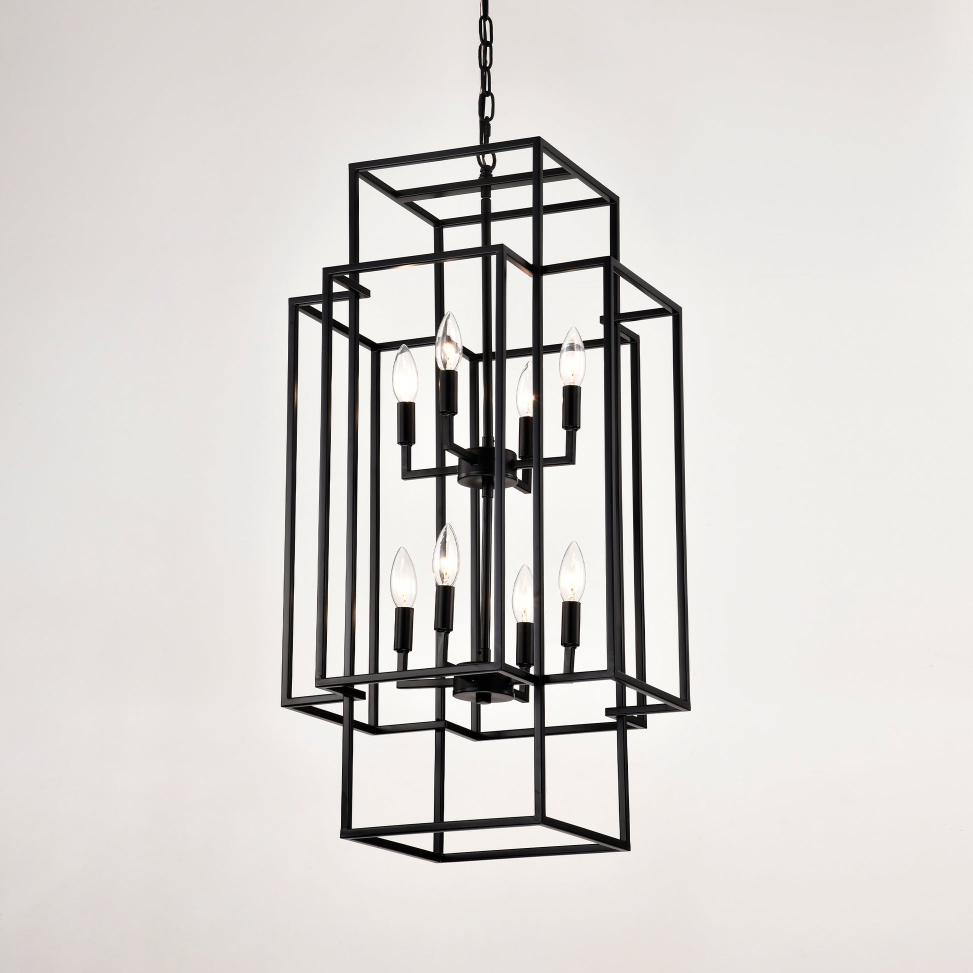 Geometric black metal chandelier with eight clear Edison bulbs