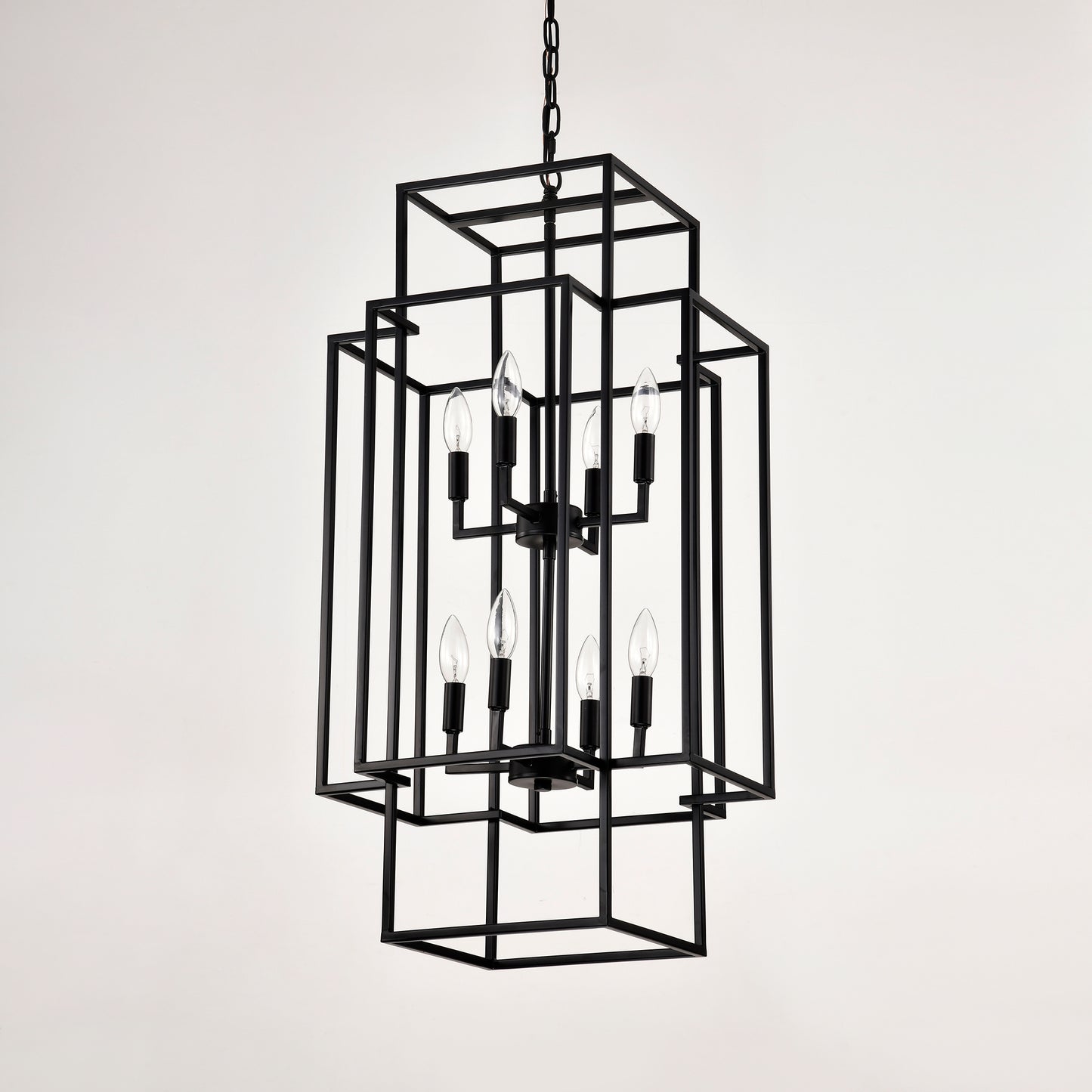 Modern black metal geometric chandelier with eight clear bulbs ideal for dining rooms