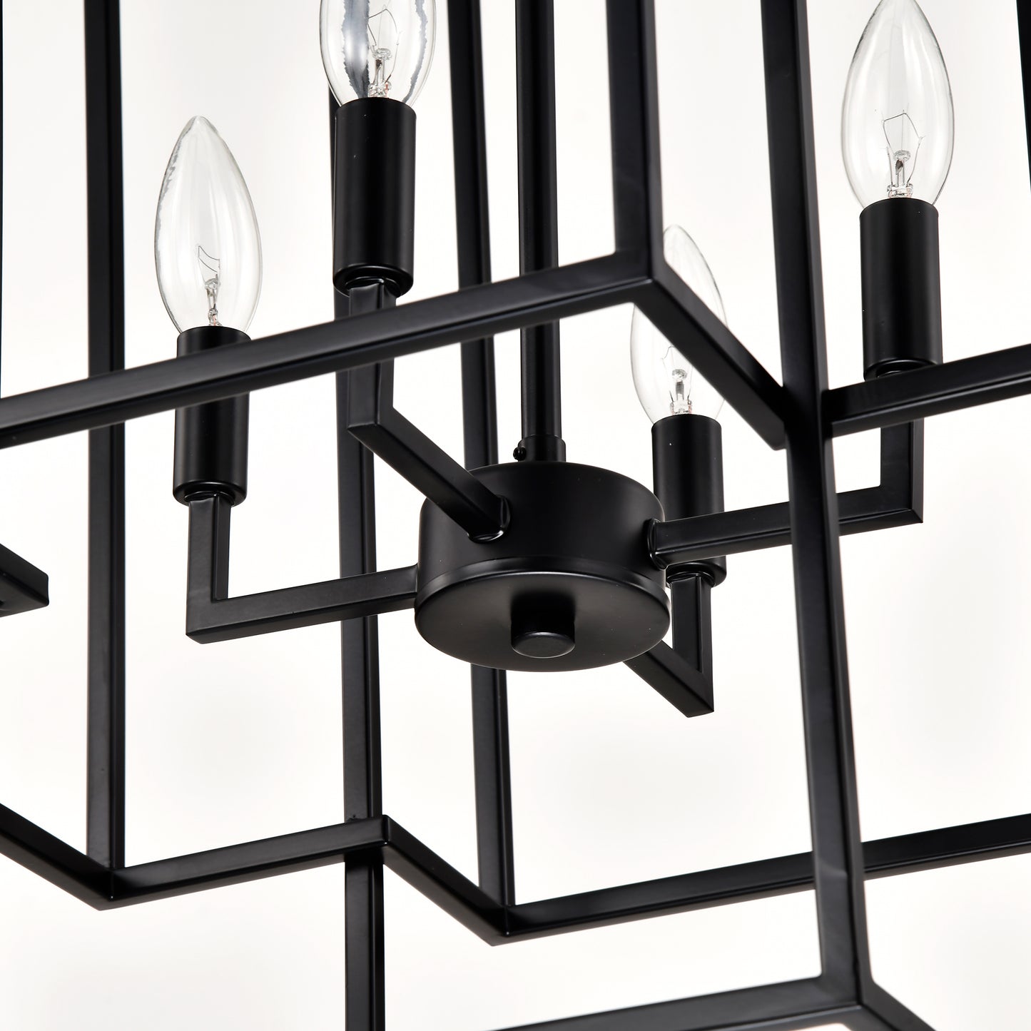 Closeup of a modern black metal cage chandelier with clear Edison bulbs