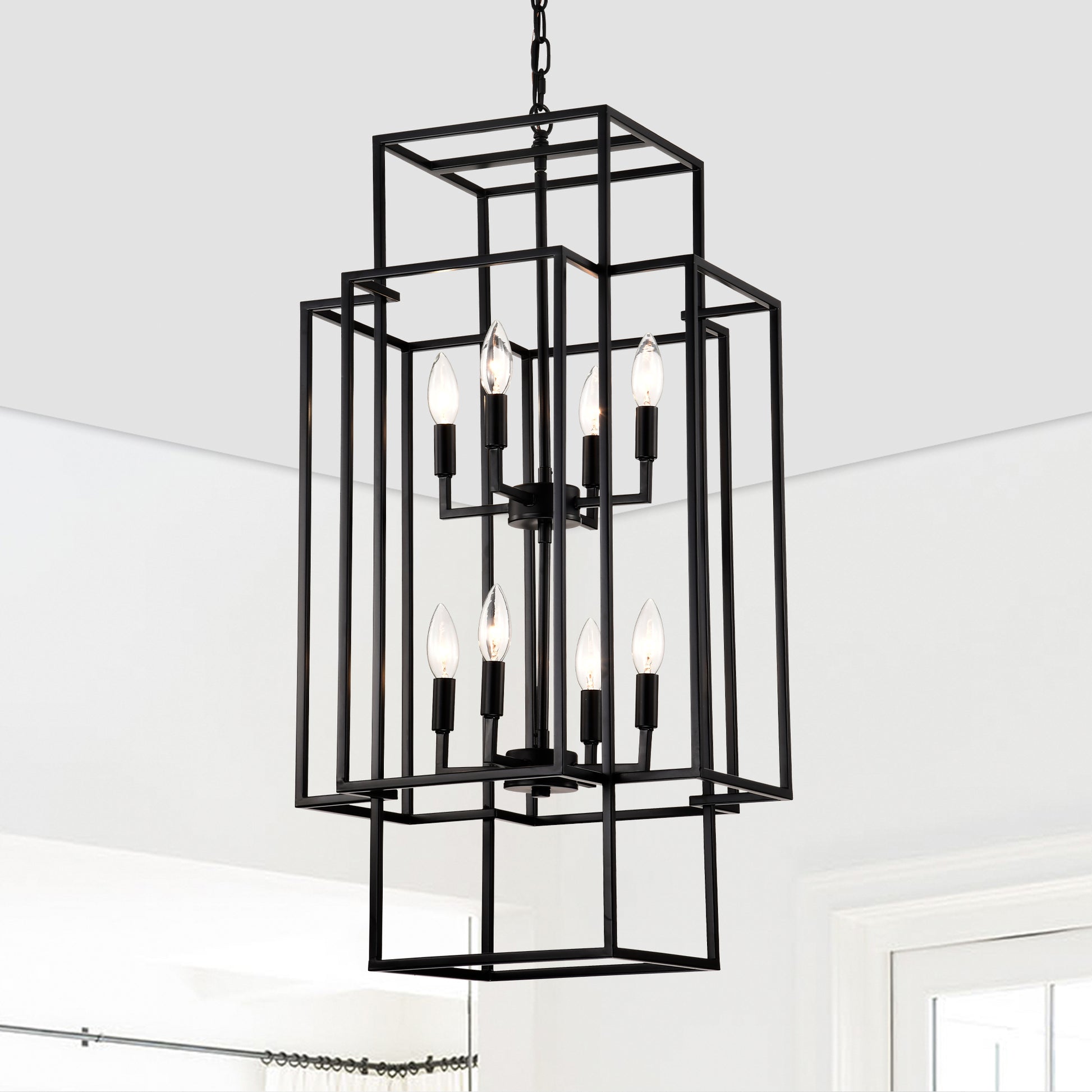 Black geometric cage chandelier with  candelabra bulbs for modern dining rooms
