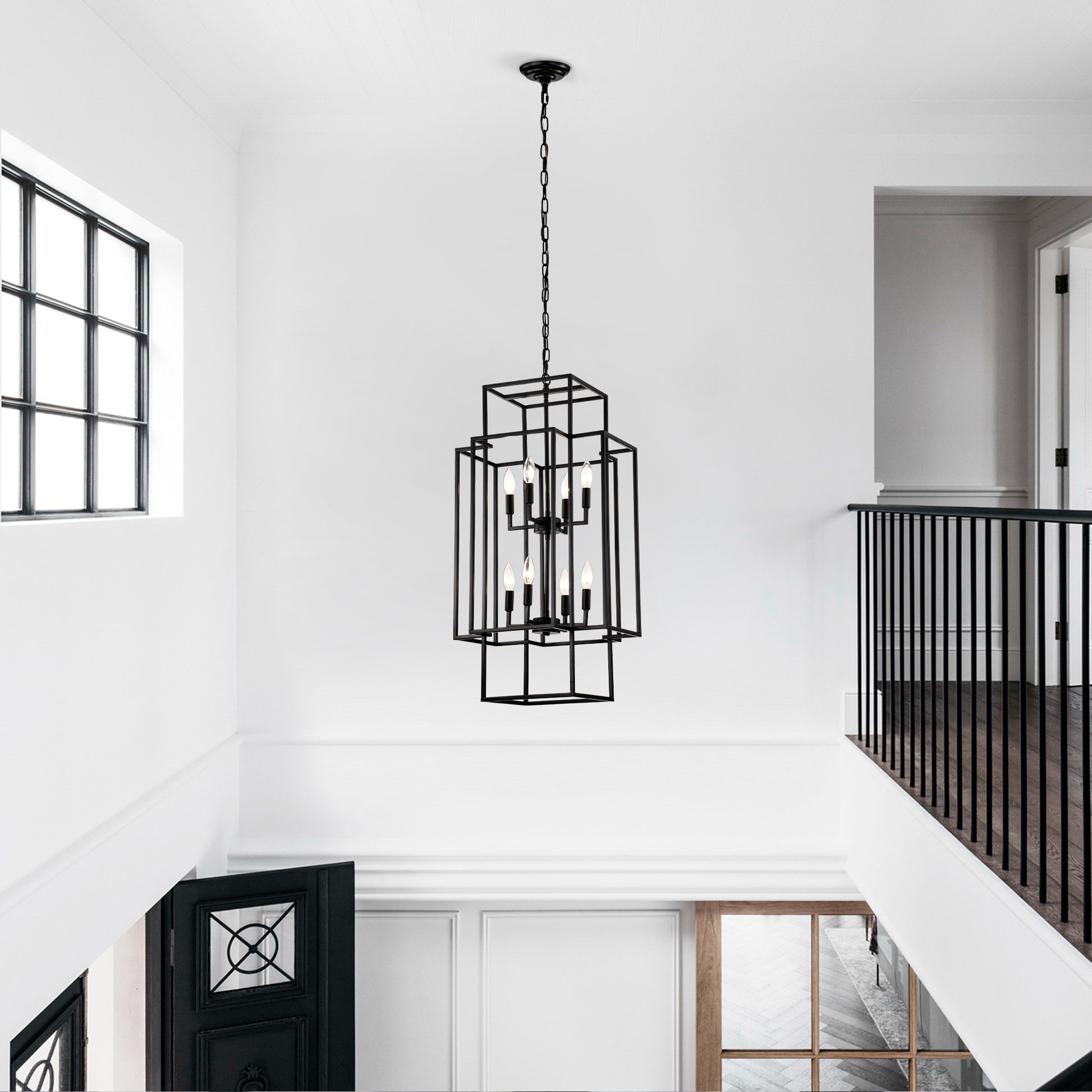Modern black metal foyer chandelier with geometric frame and eight Edison bulbs