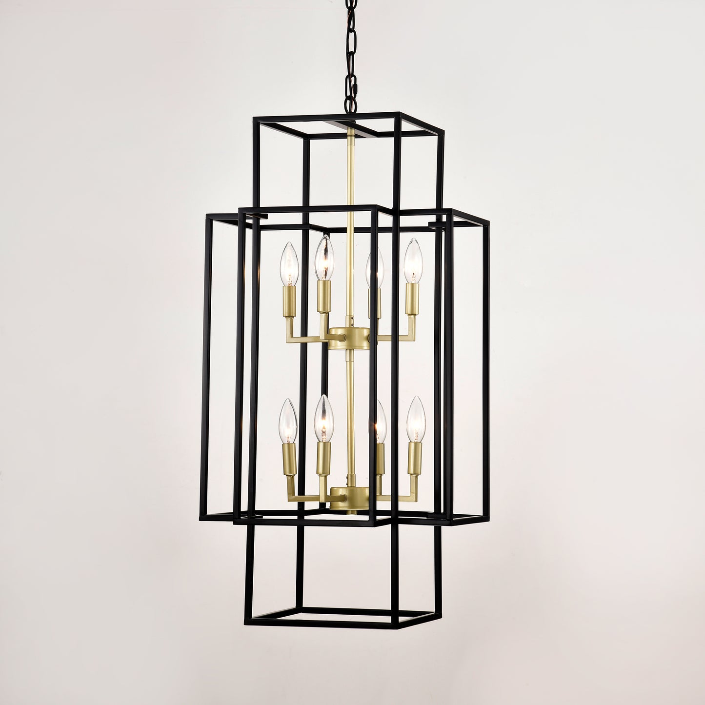 Modern black geometric chandelier with brass accents and eight candle bulbs