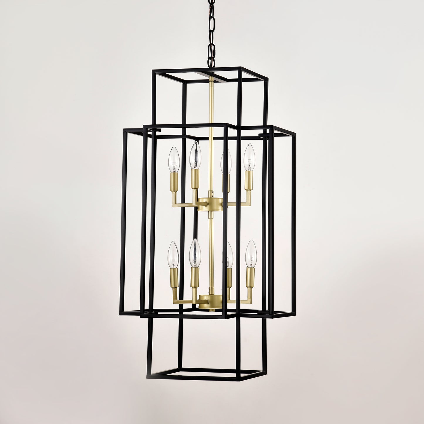 Modern black lantern chandelier with brass accents and eight candelabra bulbs