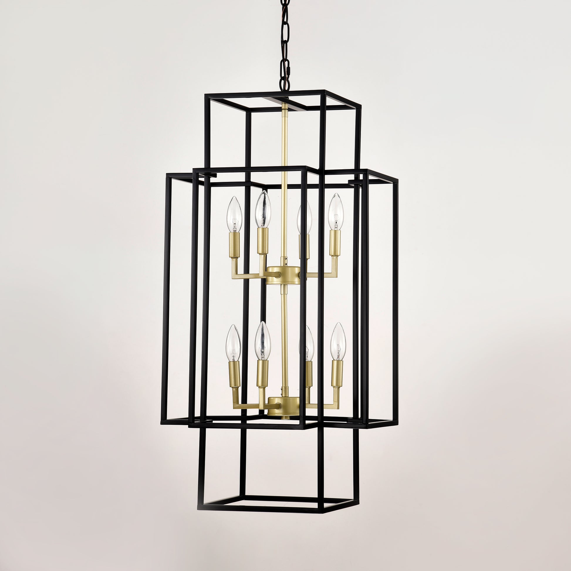 Modern black lantern chandelier with brass accents and eight candelabra bulbs