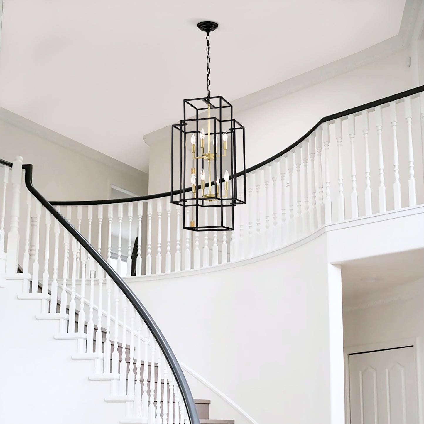 Modern geometric black and gold foyer chandelier with six candelabra bulbs