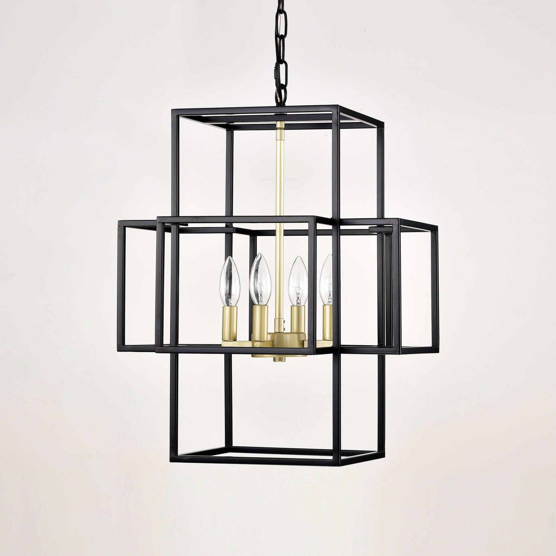 Black geometric chandelier with brushed brass accents and clear candle bulbs modern pendant lighting