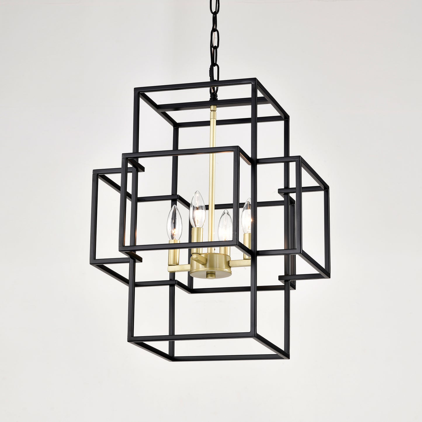 Black geometric cage chandelier with brass accents and clear candelabra bulbs